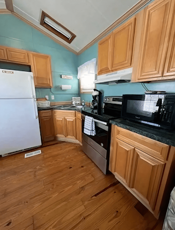 Wooden kitchen cabinets with appliances