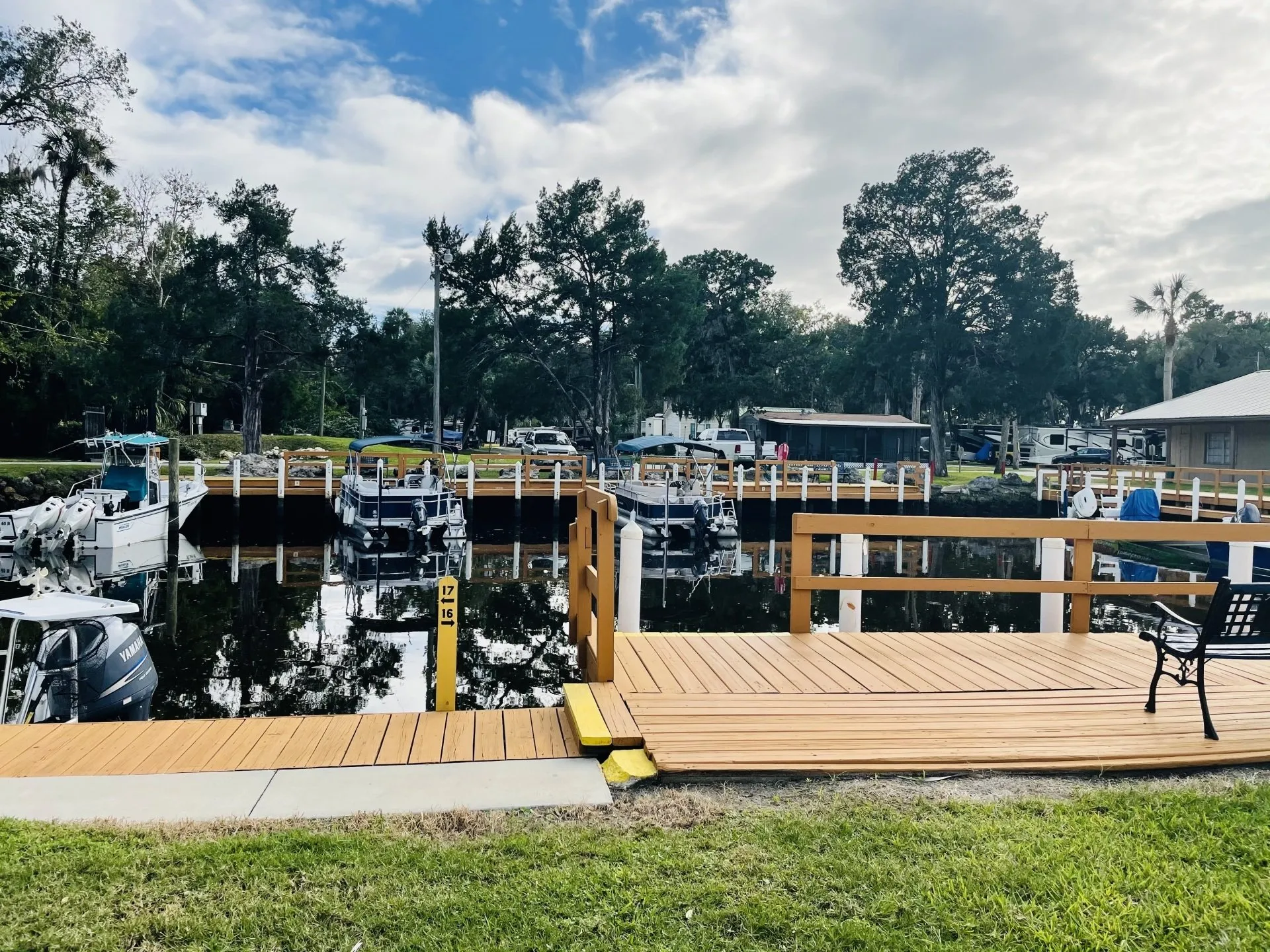Scenic riverside dock with moored boats