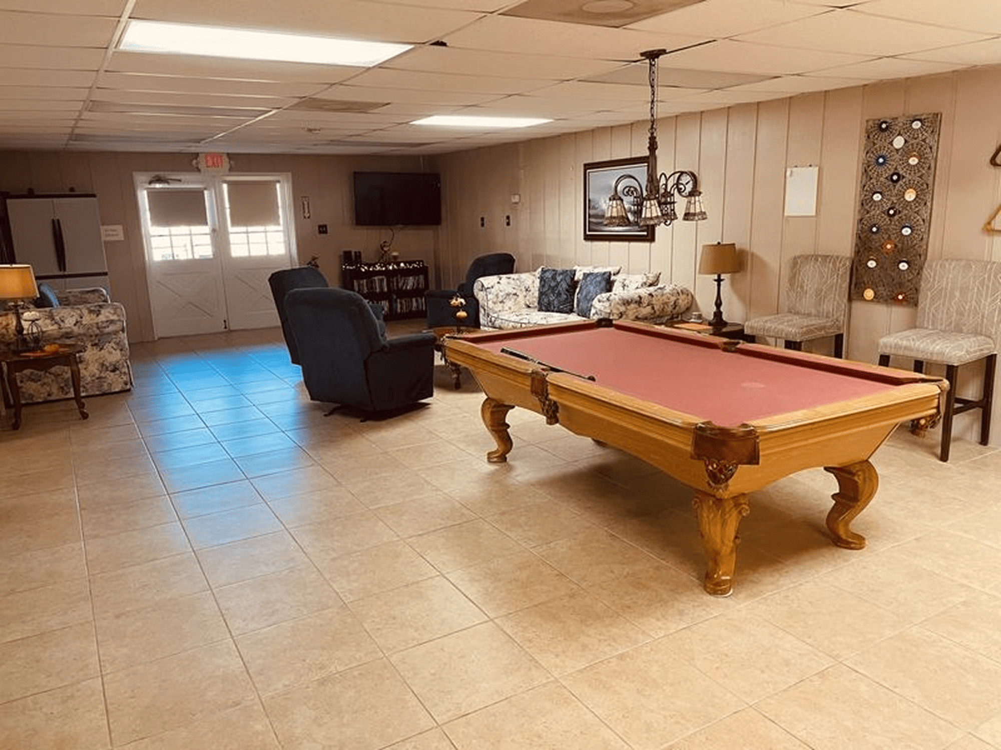 Cozy lounge area with TV and sofas