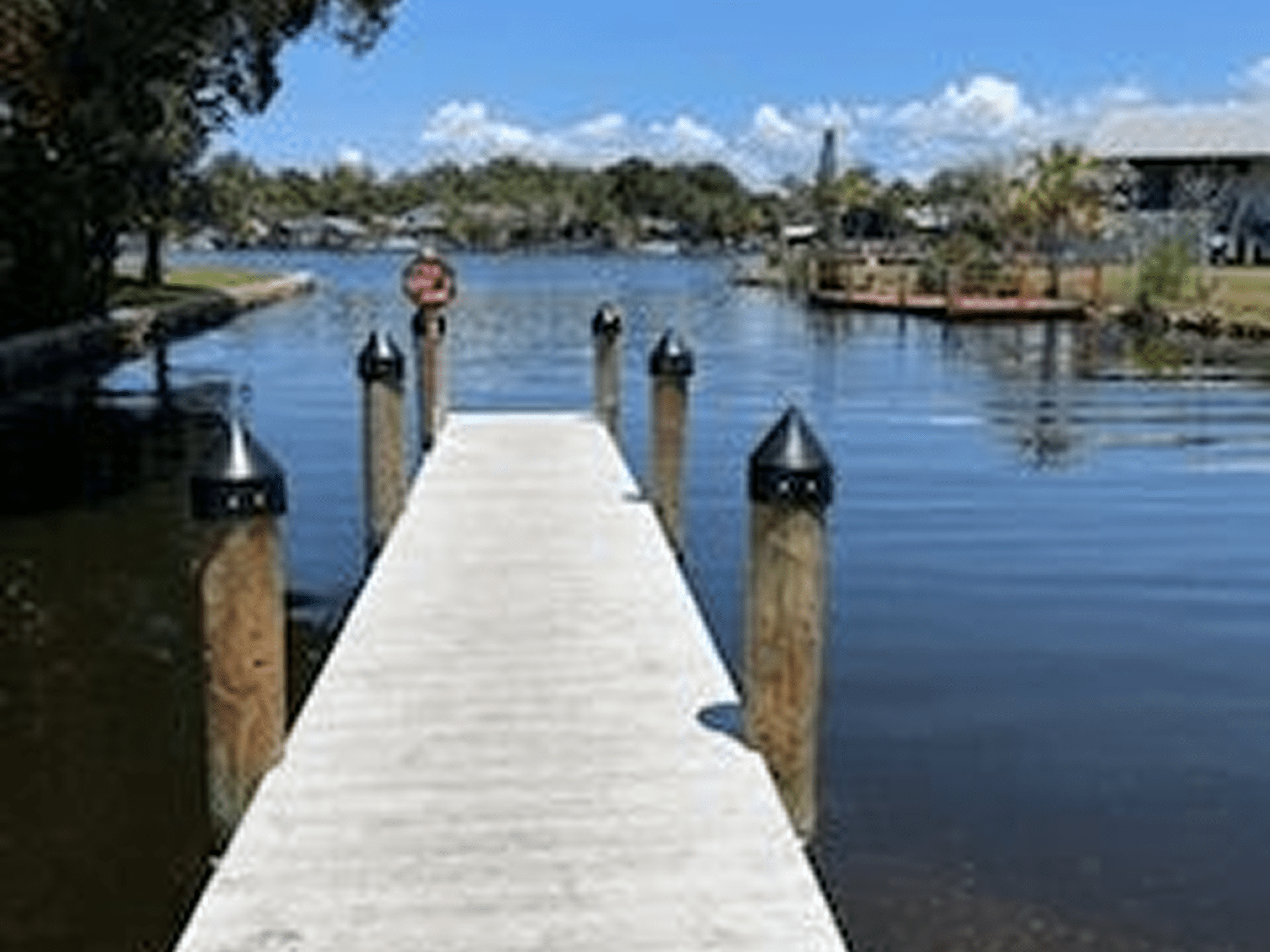 Wooden dock over calm lake waters